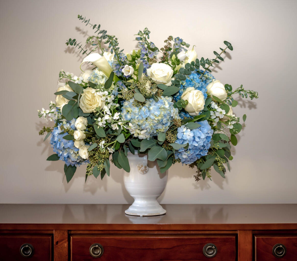 Sympathy flowers in blue and white